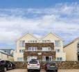 The Beach House & Porth Sands Apartments